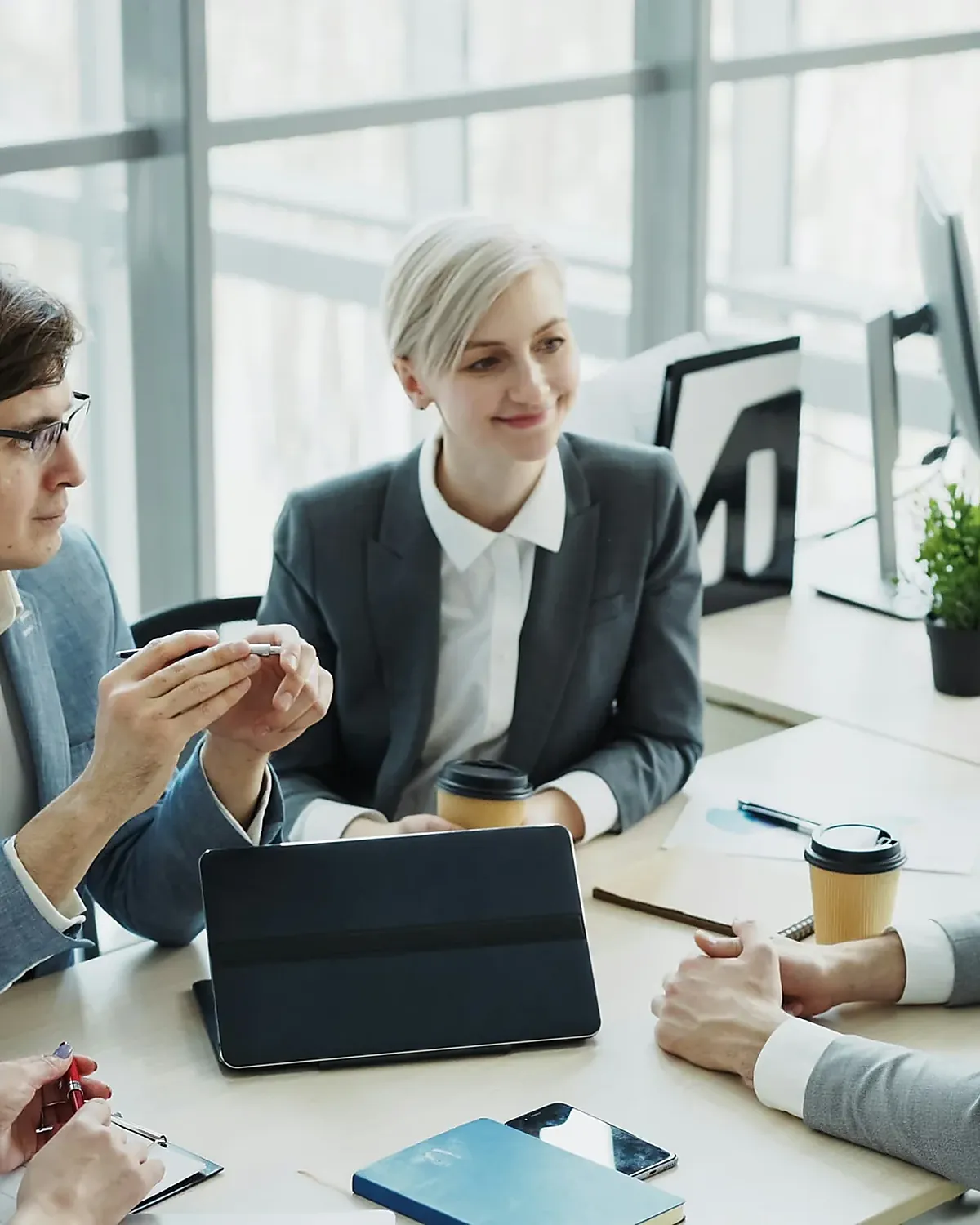 Business specialists reviewing a project together