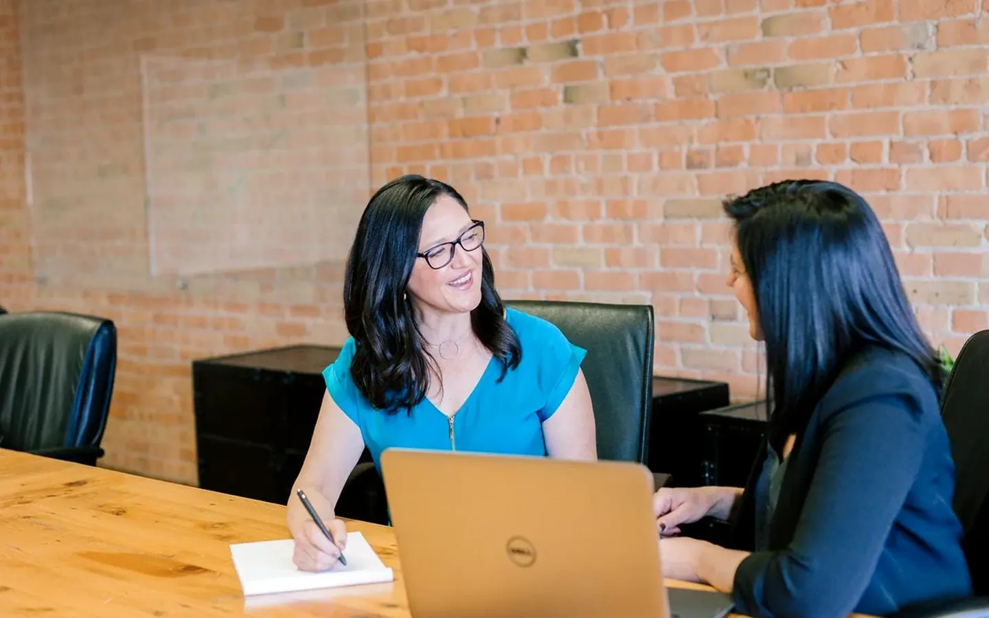 Financial team reviewing cash flow forecasts and business reports